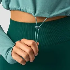 ICANIWILL Define Cropped Adjustable Long Sleeve, Mineral Green 13 ICANIWILL Define Cropped Adjustable Long Sleeve, Mineral Green -butik med fitnessudstyr 13110 278R ICANIWILL Define Cropped Adjustable Long Sleeve Mineral Green 06 0922