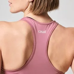 Casall Sportswear Essential Racerback, Mineral Pink -butik med fitnessudstyr 204503960R Casall Essential Racerback Mineral Pink 03 1222